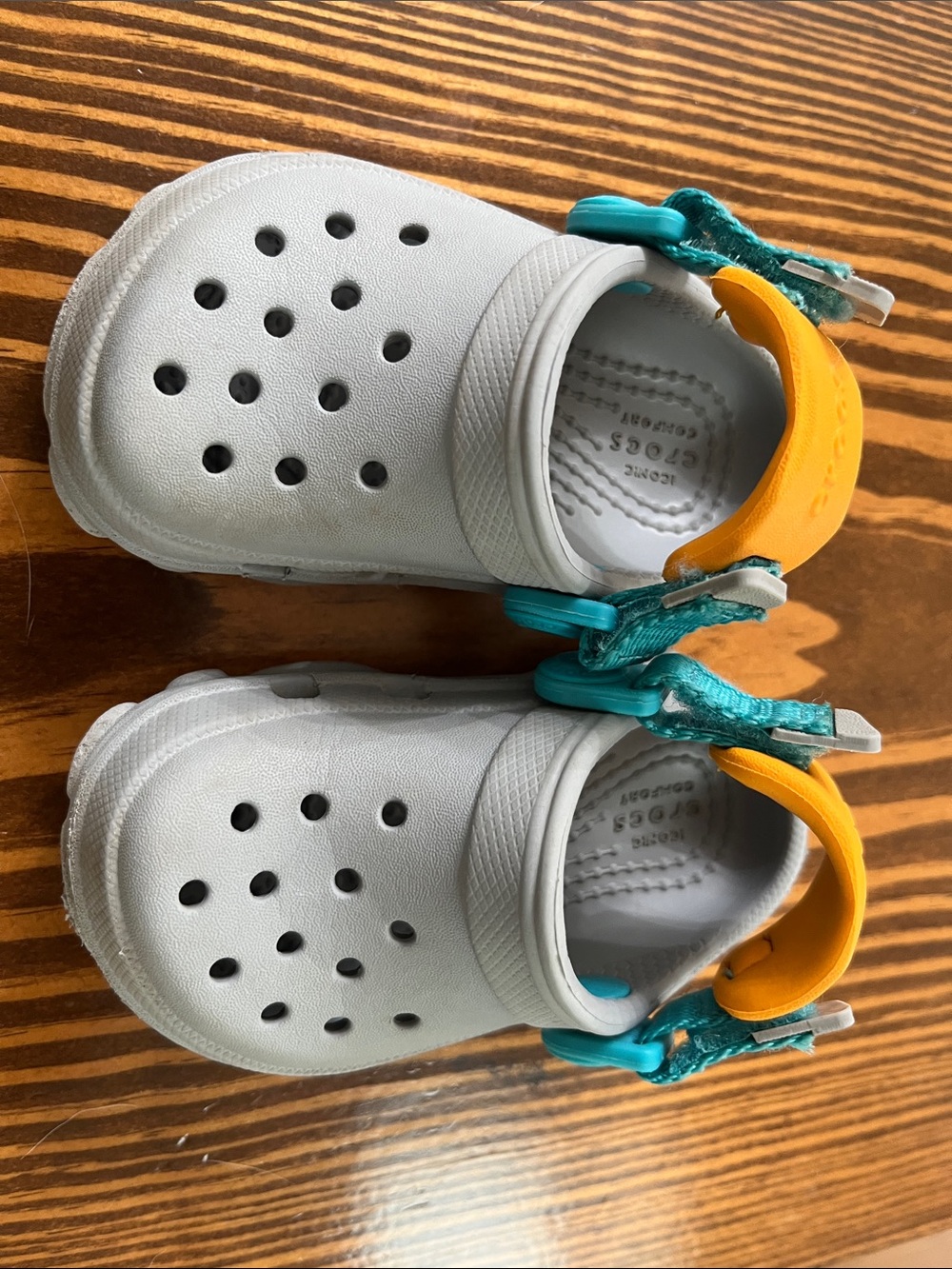 CROCS Kids Clogs with Teal and Yellow Accents